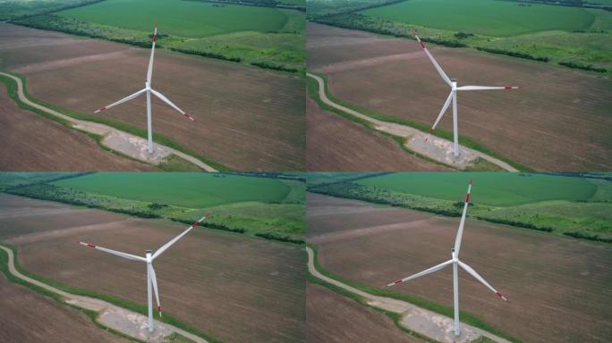 风车的鸟瞰图。世界能源电力危机。绿色能源生产理念。产生清洁可再生能源的风力涡轮机。特写镜头