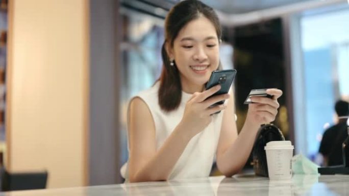 高净值快乐微笑亚洲女商人使用数字平板电脑选择购买基金和投资在自己的奢侈品品牌电子商务
