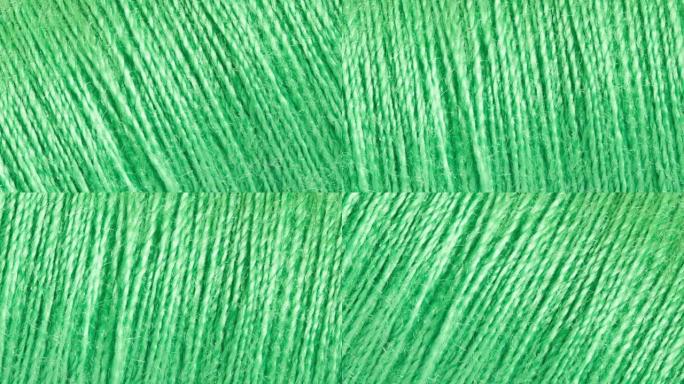 绿色线，纺织材料，旋转，转向，特写宏观，顶视图。