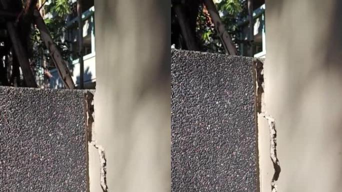 开裂的混凝土建筑或水泥墙在地震作用下在外部破裂