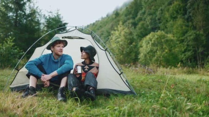 Confident multinational tourist couple talking in 