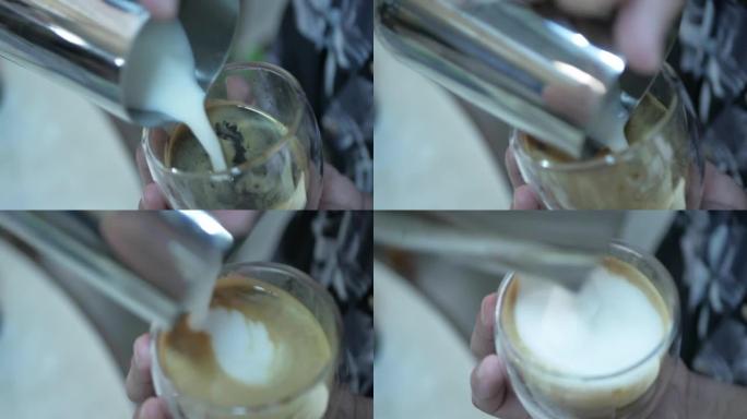 将热起泡牛奶倒入一杯新鲜的浓缩咖啡中，制成卡布奇诺咖啡