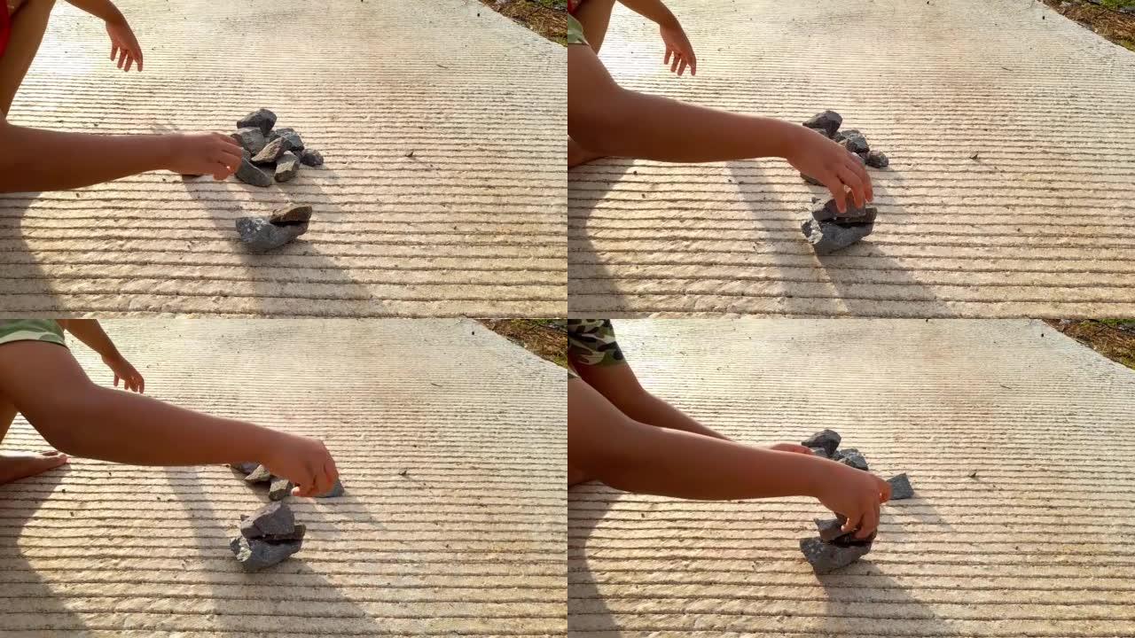 Footage of childrens game of arranging stones