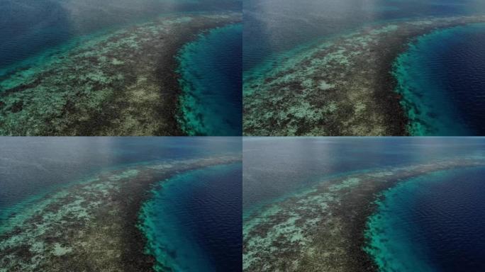 海洋天坑蓝洞屏障即兴部分的平滑空中无人机拍摄