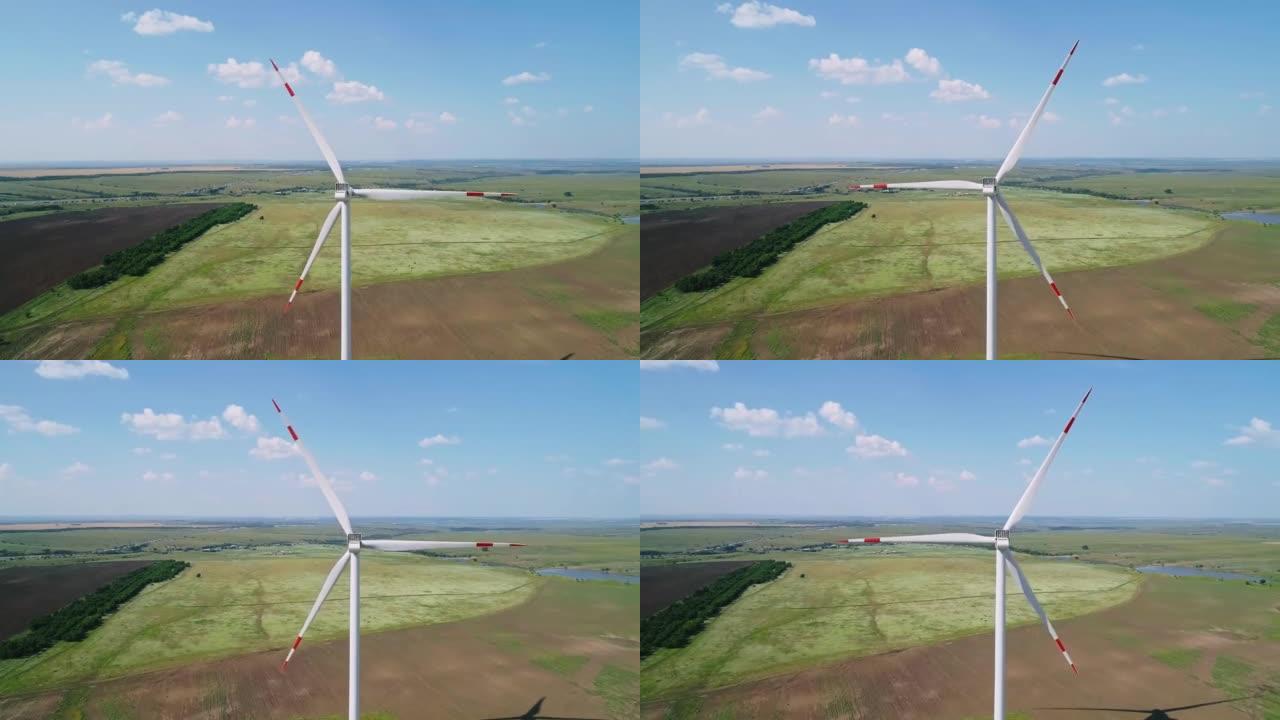 在阳光明媚的夏日，风车的鸟瞰图。世界能源电力危机。绿色能源生产理念。产生清洁可再生能源的风力涡轮机。