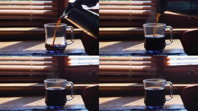 Man pours coffee into a cup in the morning