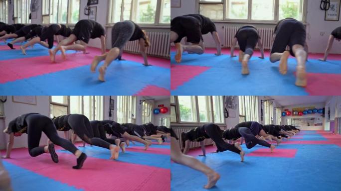 Sporty people exercising in the health club