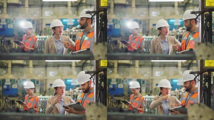 在某工业工厂，制造工艺工程师团队在机器人面前进行焊接装配工艺改进以减少生产过程中零件缺陷的讨论。废物