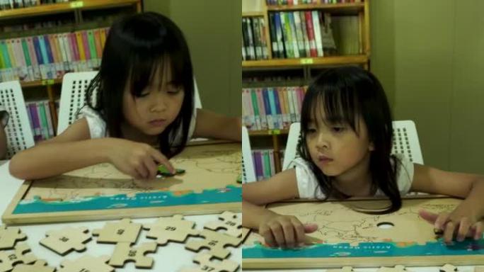 girl playing with toys in the library