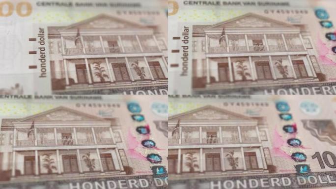 苏里南美元纸币观察和储备侧特写跟踪多莉拍摄苏里南美元纸币4k分辨率股票视频