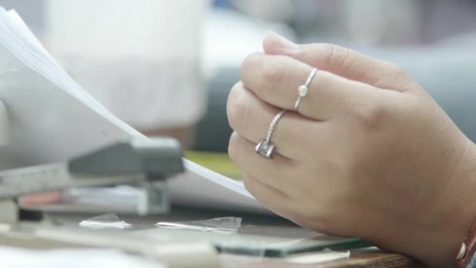 Close-up of female hands shopping online via smart