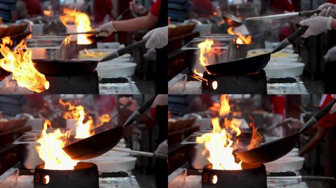 厨师在火锅中烹饪炒菜