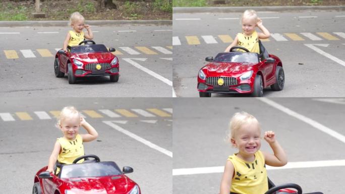 孩子在公园里学习骑电动玩具车，有迷你交通轨道、人行横道和路标。小男孩开着父母控制的小汽车玩具。