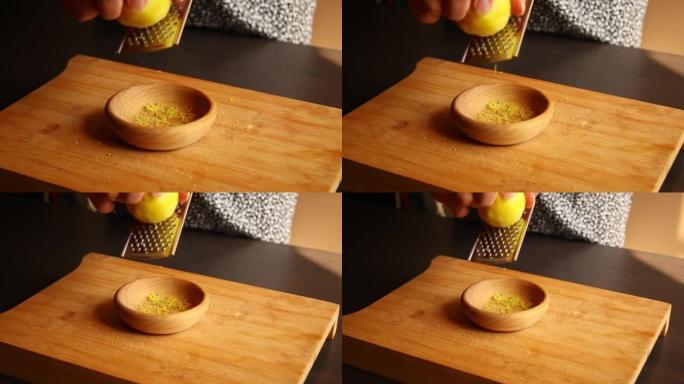 woman hands zesting a lemon close up