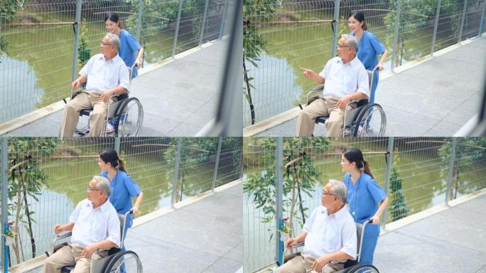 理念疗养院活动带老人坐轮椅在户外放松。