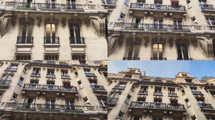 巴黎建筑设计精美。法国巴黎传统风格房屋的前视图。印象就像你在童话里。摄像机慢慢向上移动。