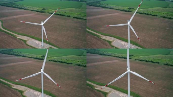 风车的鸟瞰图。世界能源电力危机。绿色能源生产理念。产生清洁可再生能源的风力涡轮机。特写镜头