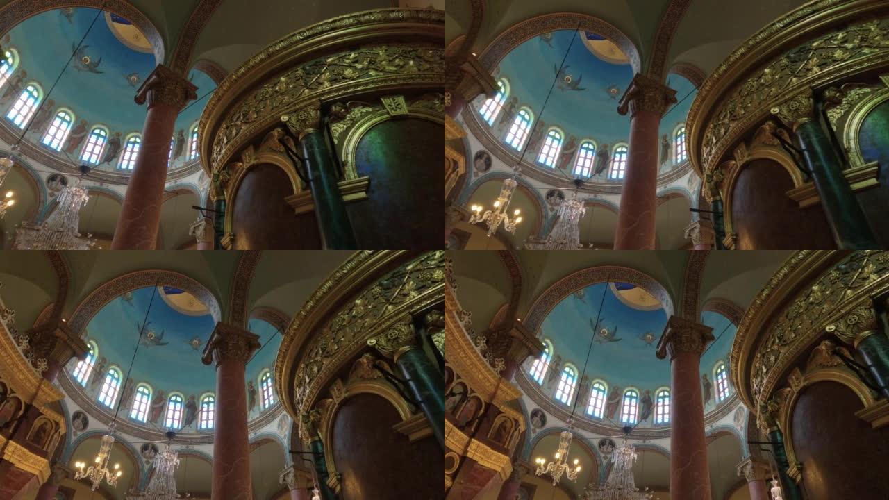 抬头看看美丽的圣乔治教堂，金色的细节和天花板上的画，科普特开罗