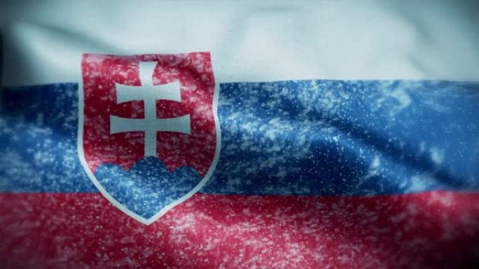 4K暴风雪/雪在斯洛伐克国旗股票视频。冷淡的斯洛伐克国旗。旋转/旋转的冰晶。雪花掠过斯洛伐克国旗。
