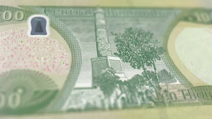伊拉克10000第纳尔观察和储备侧特写跟踪多莉拍摄10000伊拉克纸币当前10000伊拉克第纳尔纸币