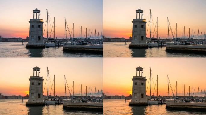 意大利威尼斯城市景观大运河灯塔附近停泊的许多船只的延时日出场景