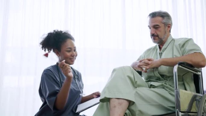 Female orthopedist examining a patient in the hosp