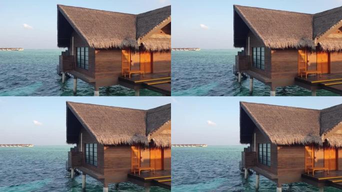 Details of water villa palafitte in Maldives. Slow