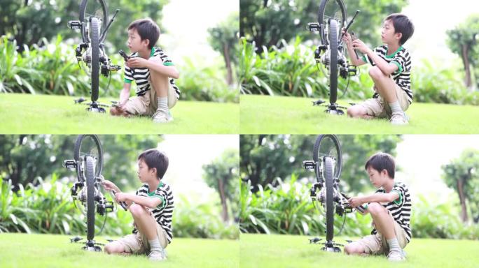 男孩修理自行车修车