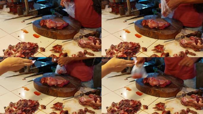 屠夫在生产过程中生产香肠的生肉