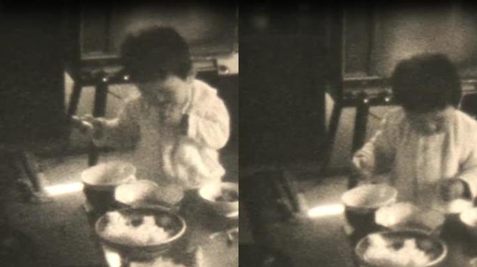 60年代的8毫米镜头 -- 和妈妈一起吃饭的男婴