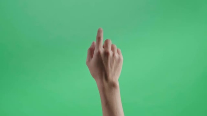 在绿色屏幕背景上单击一根手指
