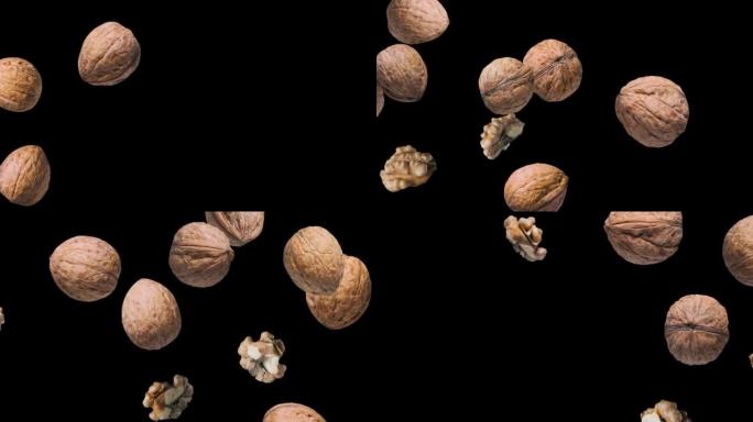 Three walnuts and two shelled walnuts rotate slowl