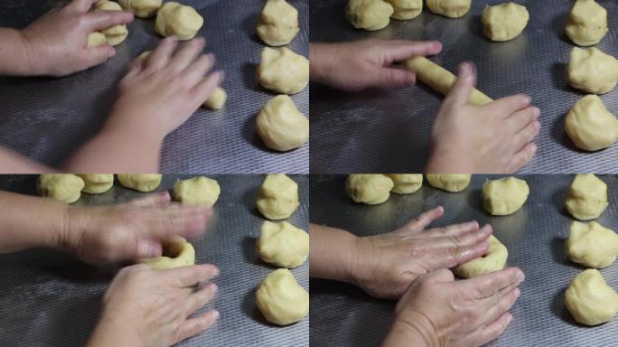 成年女性双手揉捏并塑造低碳水化合物的酮百吉饼