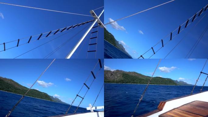 桅杆的拍摄，两侧各带梯子，背景为热带岛屿
