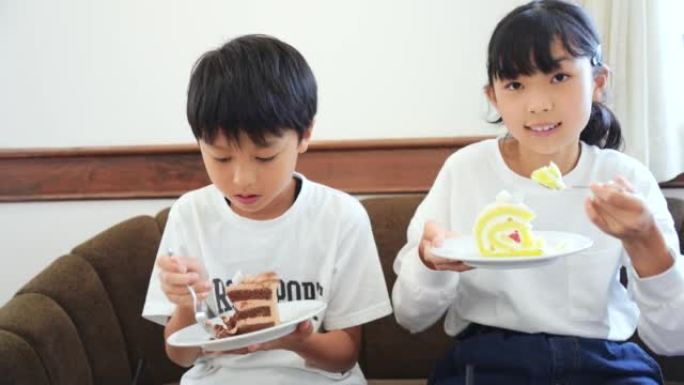 日本孩子饭后吃蛋糕做甜点