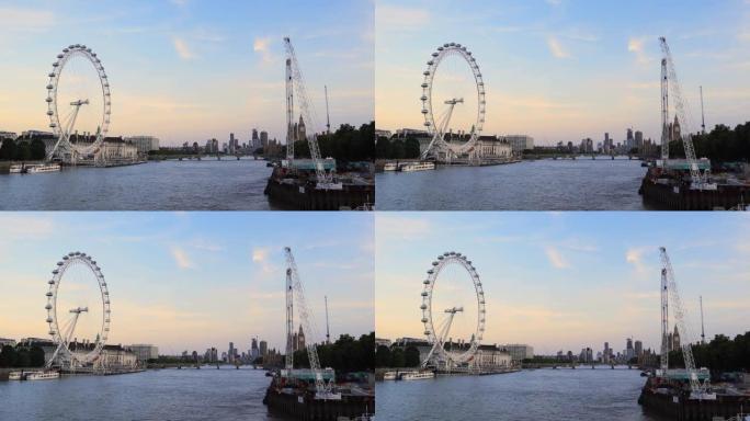 日落时伦敦眼的简单景观，背景为Thams河蓝天威斯敏斯特桥