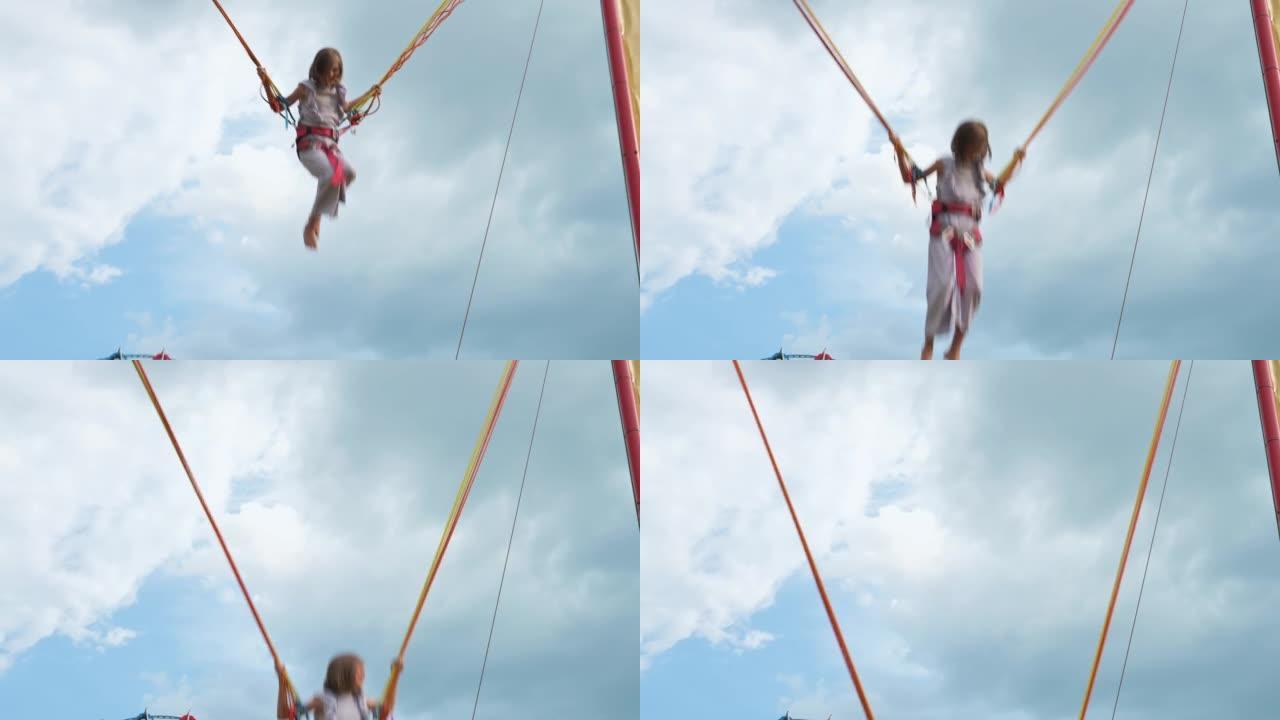 Happy girl jumping with belts. 4k video footage