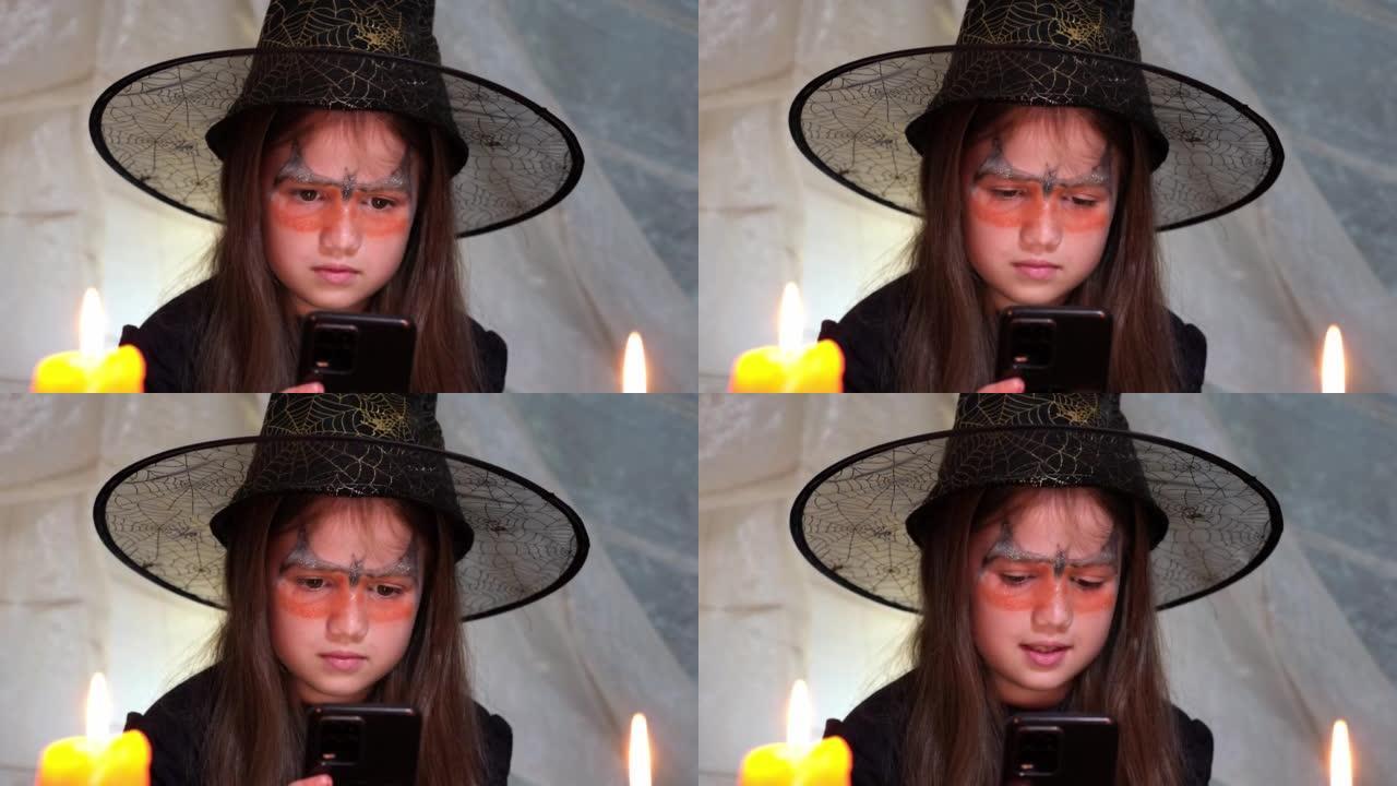 小女巫在手机上上网搜索万圣节夜魔咒