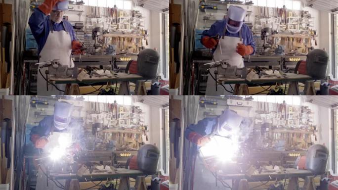 金属加工用人使用焊接机进行钢缝。火花飞舞