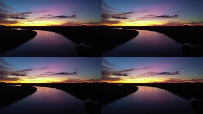 马来西亚砂拉越古晋美丽的日落和萨拉克河的鸟瞰图