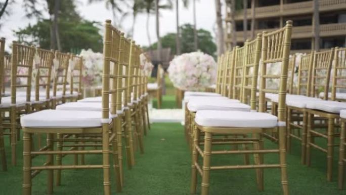 Wedding Woods chair's gold set up arch with flower
