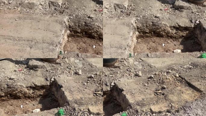 正在翻新的人行道上的洞