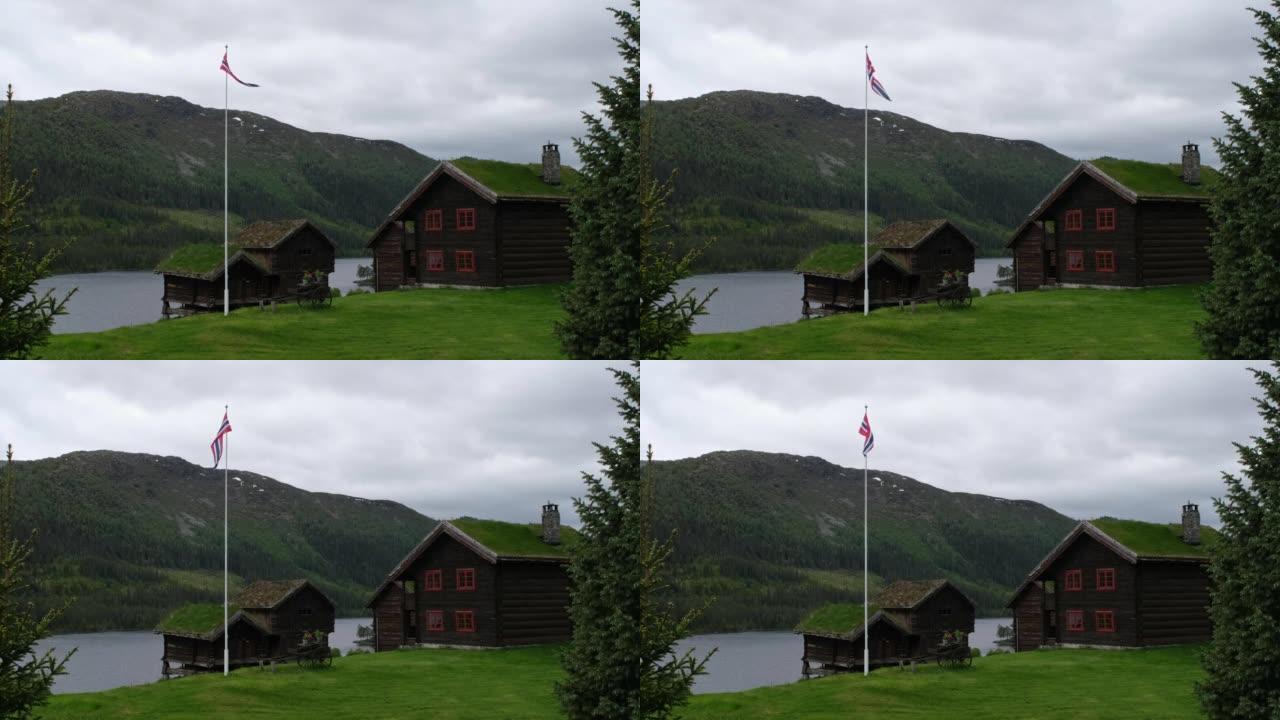 挪威美妙的风景。Aust Agder。草屋顶房屋的美丽风景。挪威传统建筑山脉、树木和雪背景4K UH