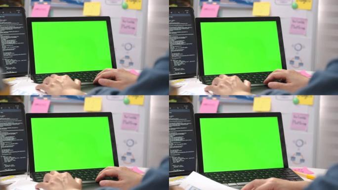 mockup移动绿屏。在笔记本电脑上关闭移动软件程序员编码设计原型移动应用程序的ui界面
