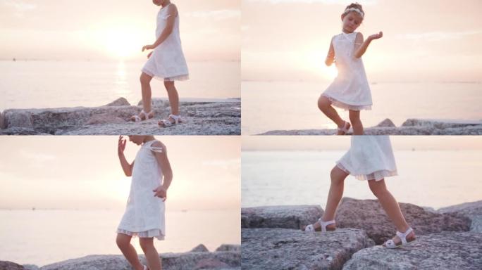 Little girl walks dancing on the dike