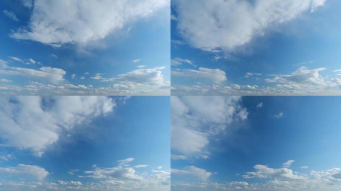 Summer blue sky with fluffy white clouds. White cl