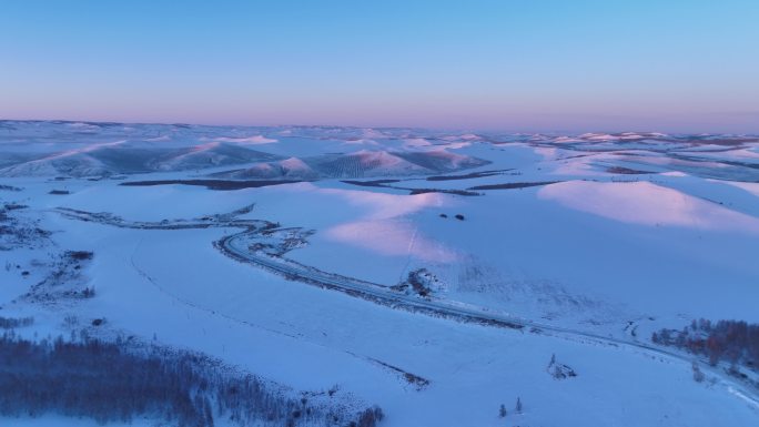 航拍4K内蒙古苍茫雪原夕照