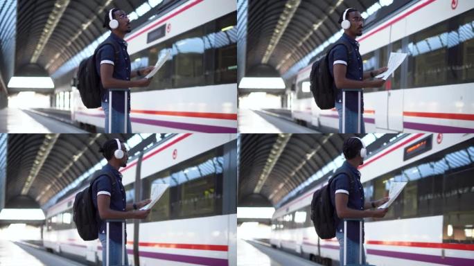 非洲男性看着他的地图