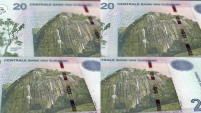 苏里南美元纸币观察和储备侧特写跟踪多莉拍摄苏里南美元纸币4k分辨率股票视频
