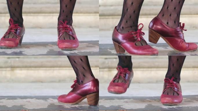 弗拉门戈舞者穿着红色鞋子的腿慢动作特写，西班牙安达卢西亚。